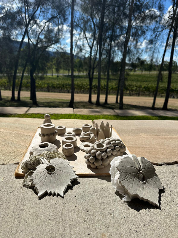Ceramic items ready to be painted at Lisa Hölzl Totem workshop at Winmark Wines