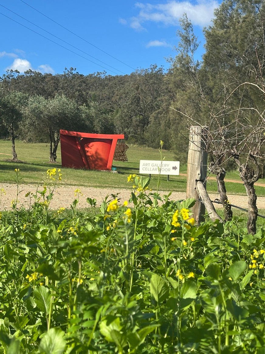 Sculpture and Art Gallery sign at Winmark Wines