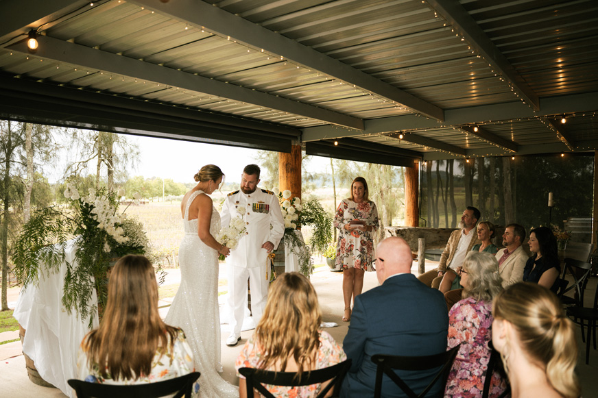 Couple being married at Winmark Wines